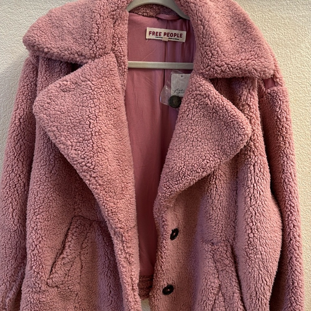 Brand new with tag this beautiful coat by free people rose color, oversized fit